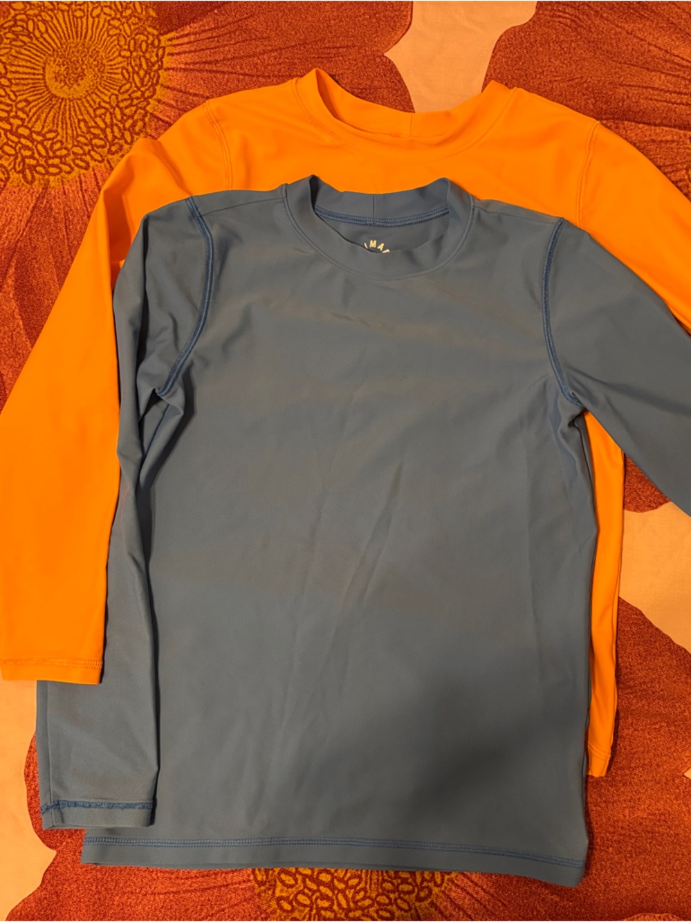 Primary kids Long-Sleeve rash guards in Blue and Orange